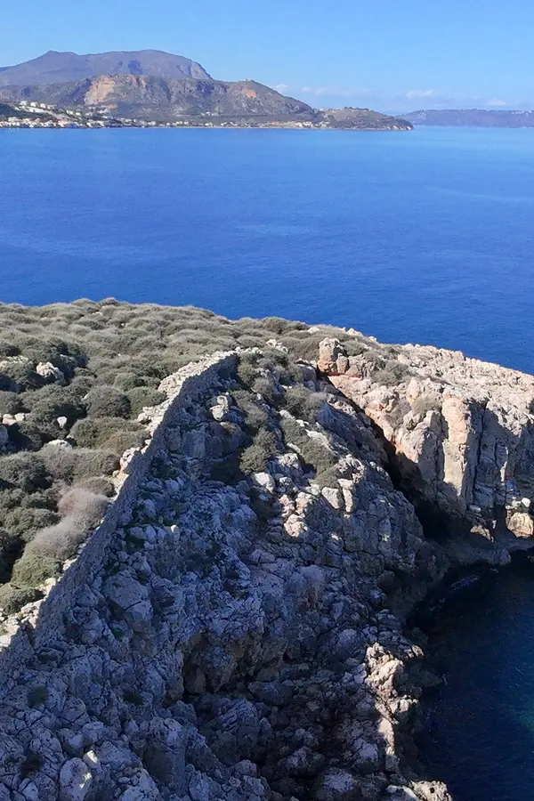 Coastal views and traditional architecture lining the picturesque village of Karga island in Crete.